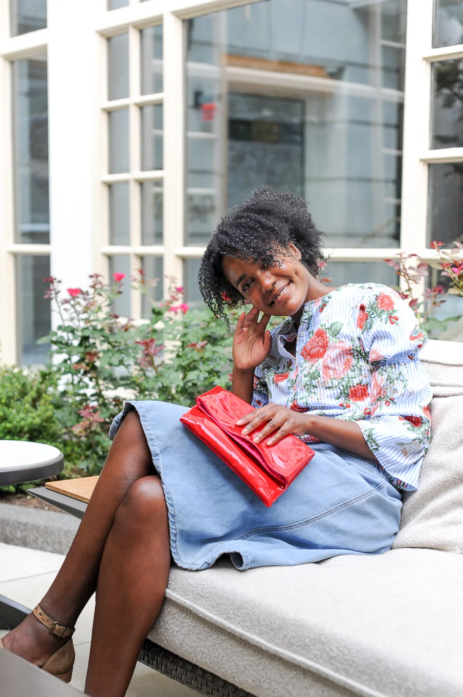 Zoë Bright with red clutch